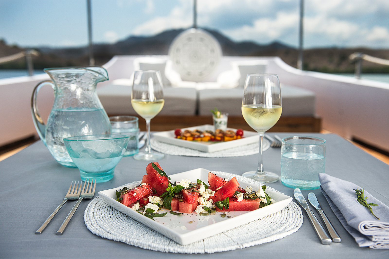 Beautiful dinner setting on a luxury yacht in Komodo Island