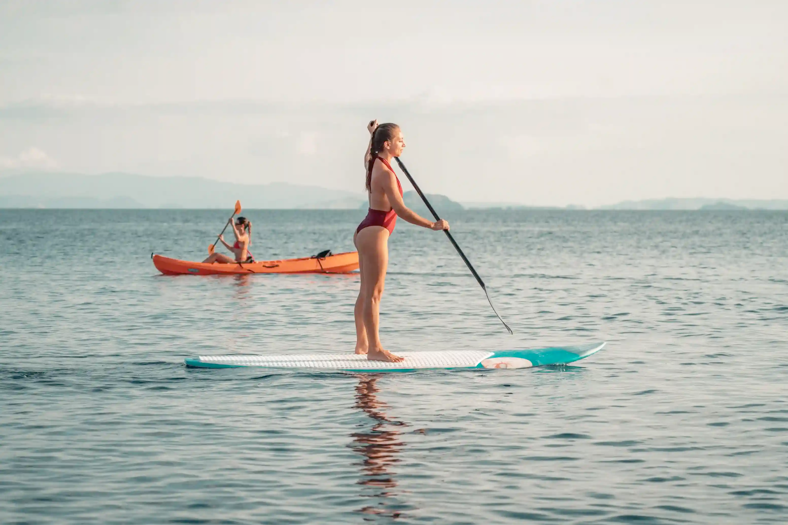 A stand up paddleboarder in Kelor